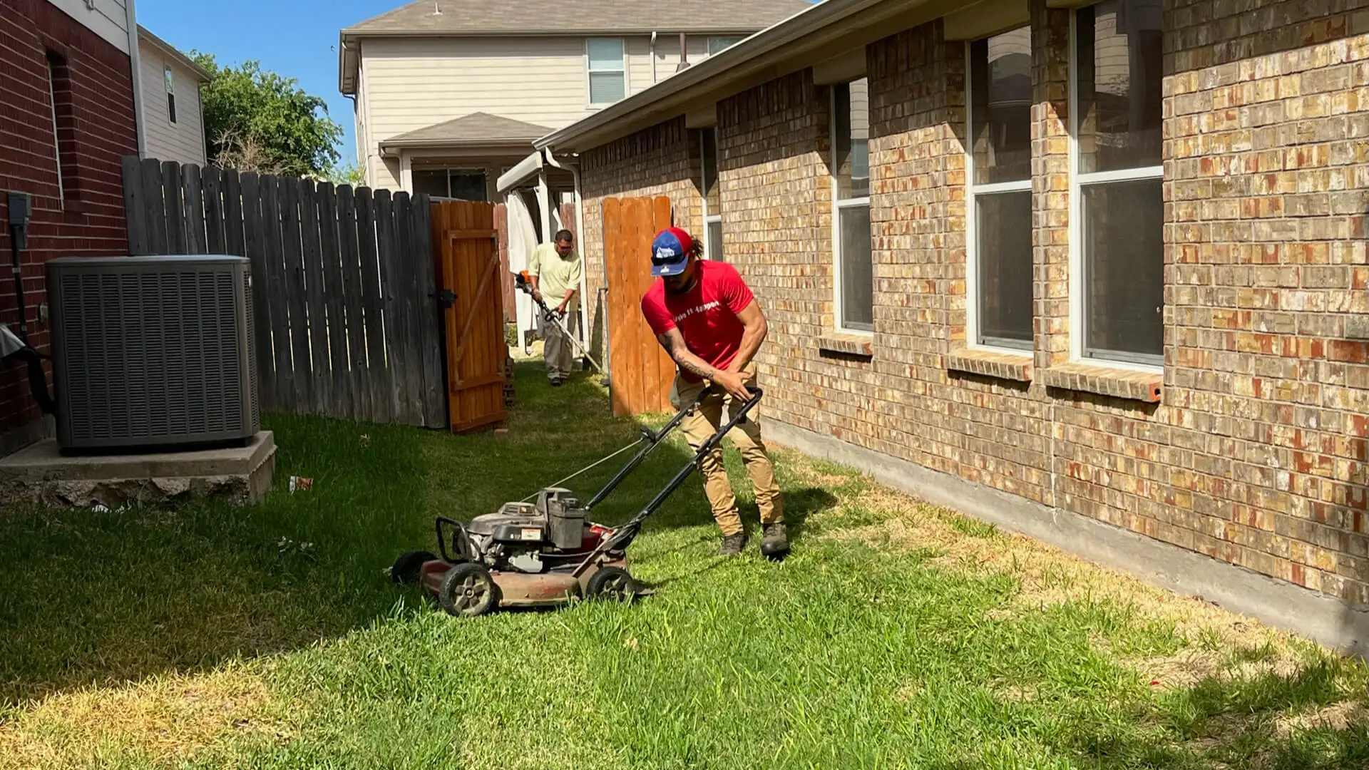 Mowing a lawn at a home in Keller, Texas.